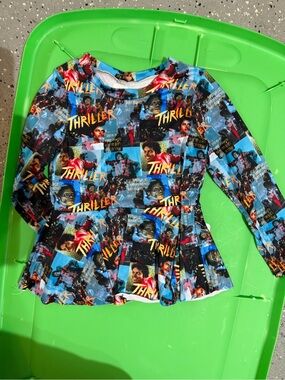 Thriller Print Long-Sleeve Peplum Top - Blue